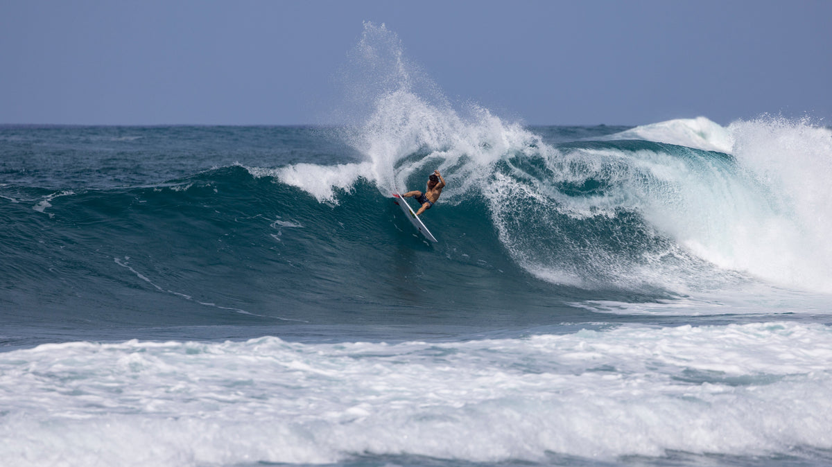 Salty Crew team rider surfing a wave