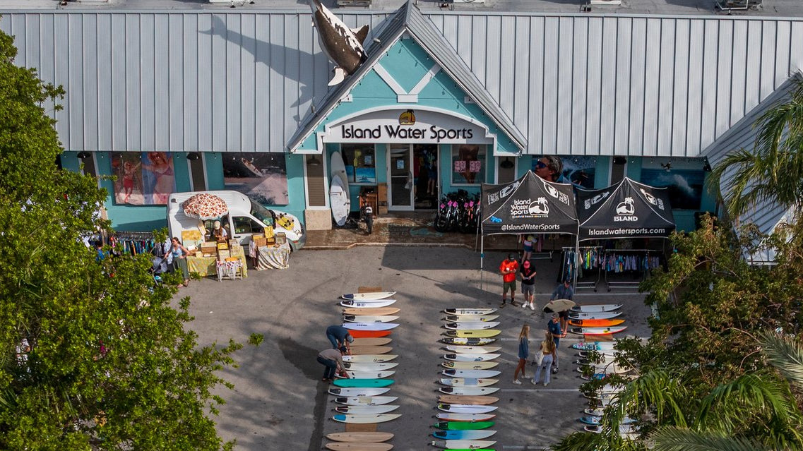 Aerial view of surfboards laid out in the Island Water Sports Deerfield Beach lot