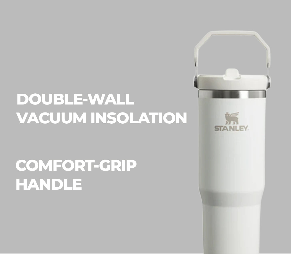 Stanley insulated bottle with comfort-grip handle on a gray background