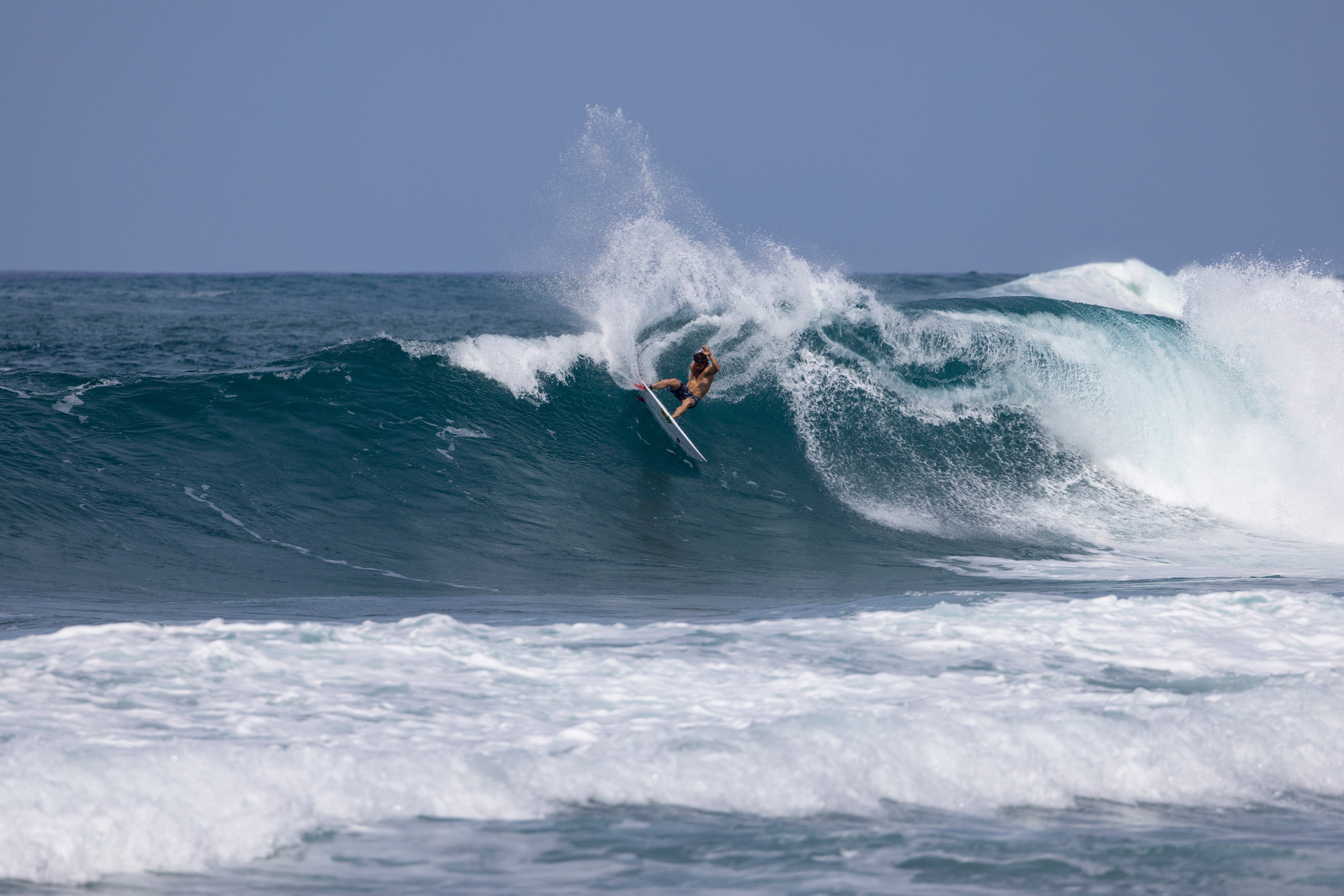 Salty Crew team rider surfing a wave